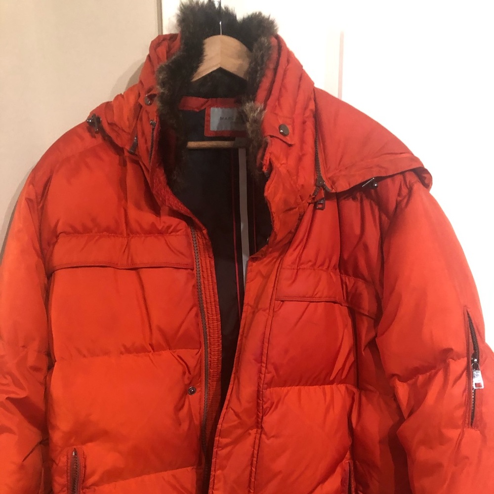 Stylish winter jacket with fur color and good.
